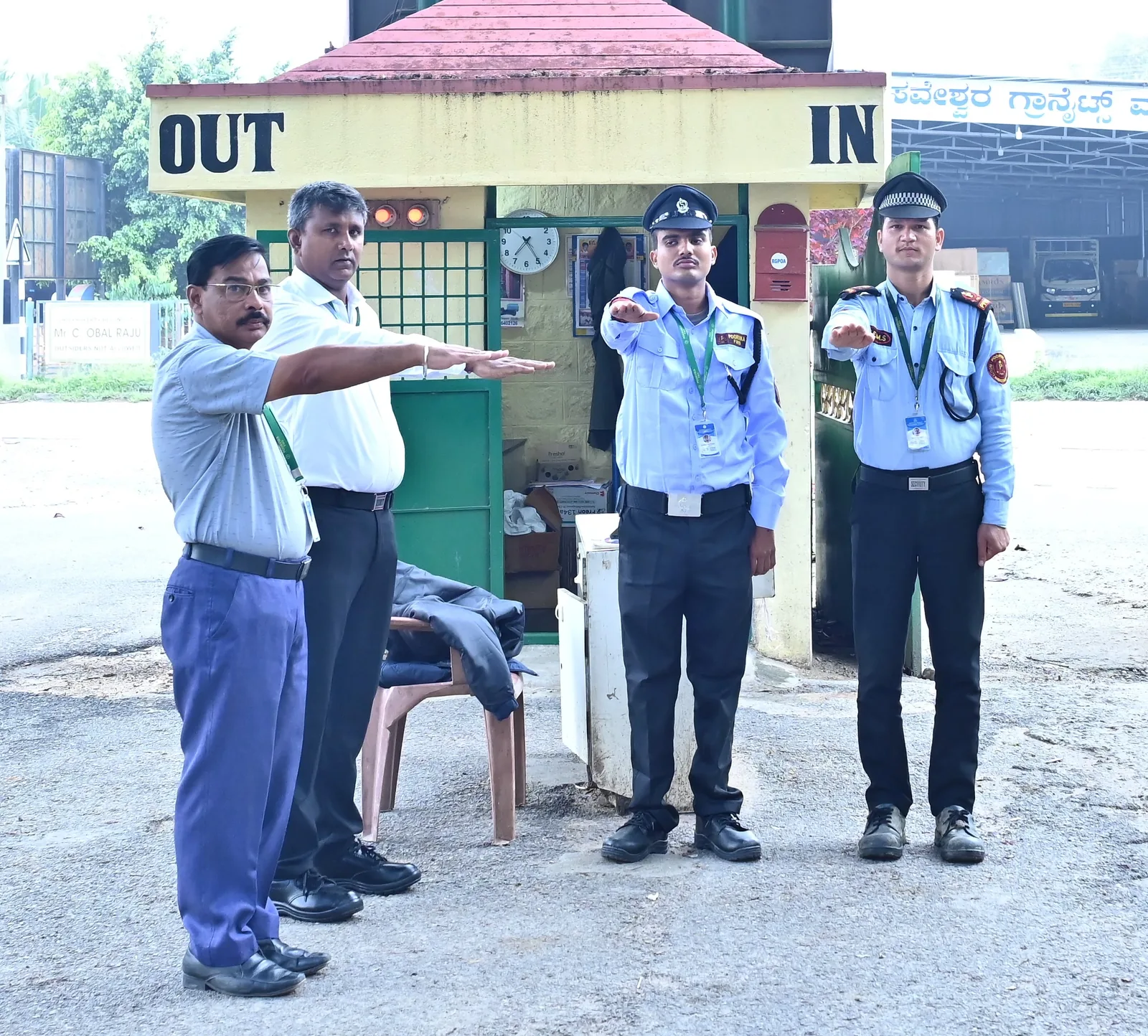 Poorvika FMS guards at a client gate sentry booth